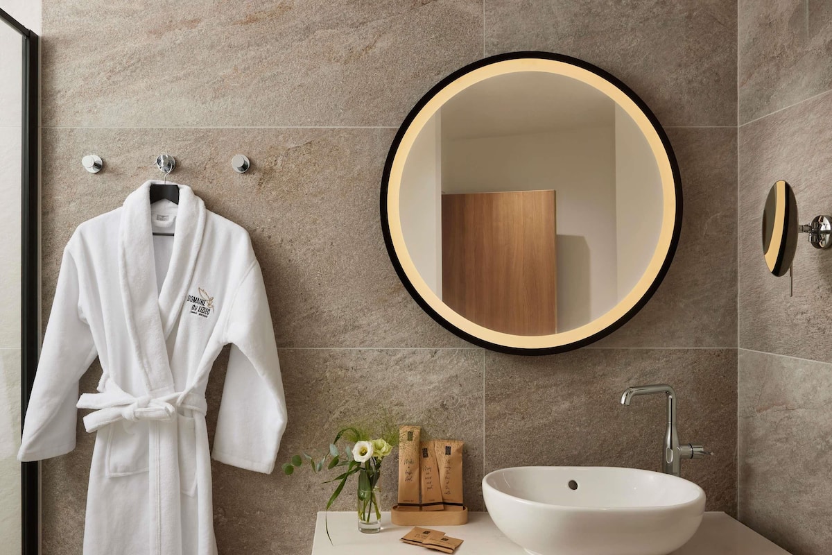 Pillow-top beds, free minibar, in-room safe, laptop workspace
