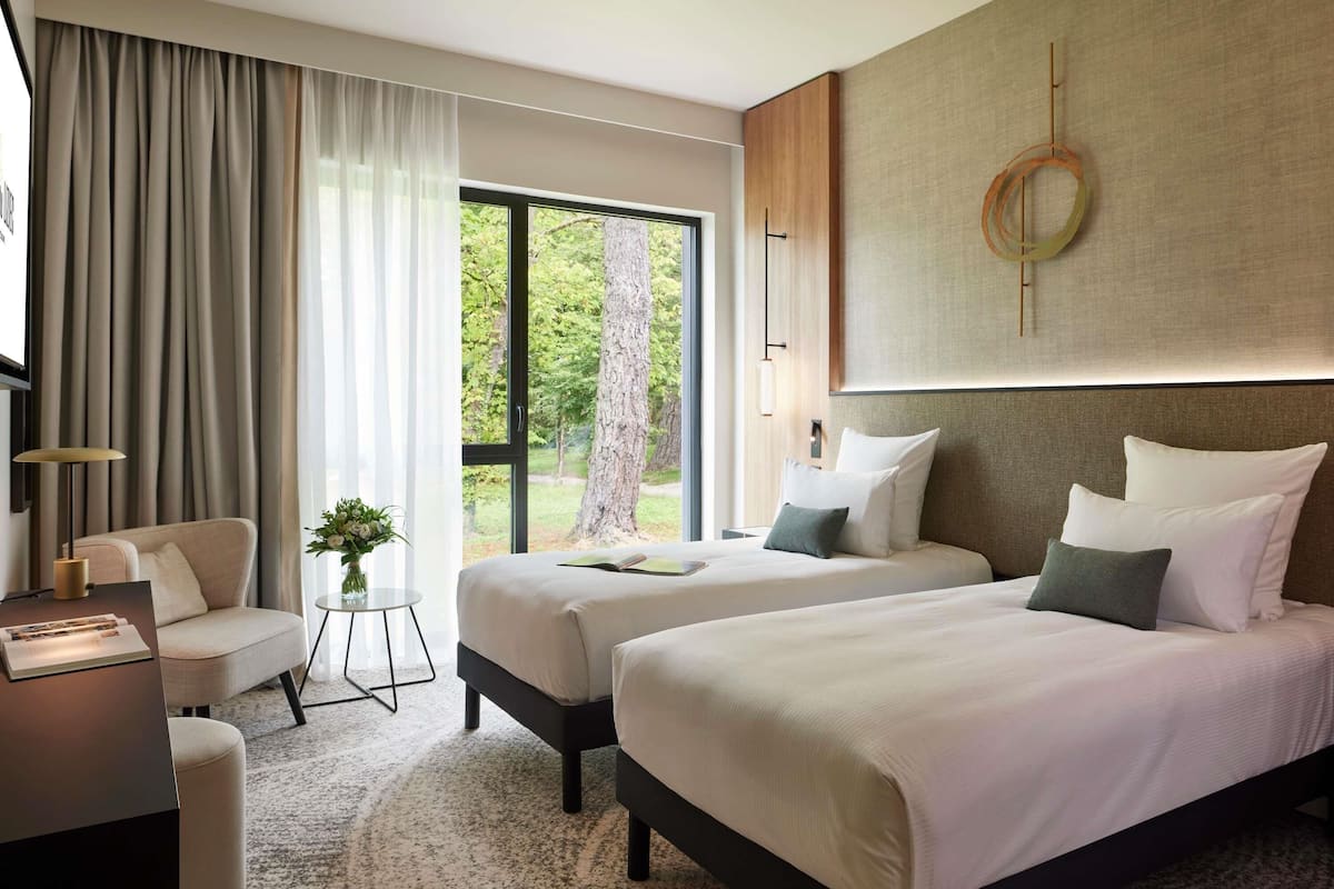Pillow-top beds, free minibar, in-room safe, laptop workspace