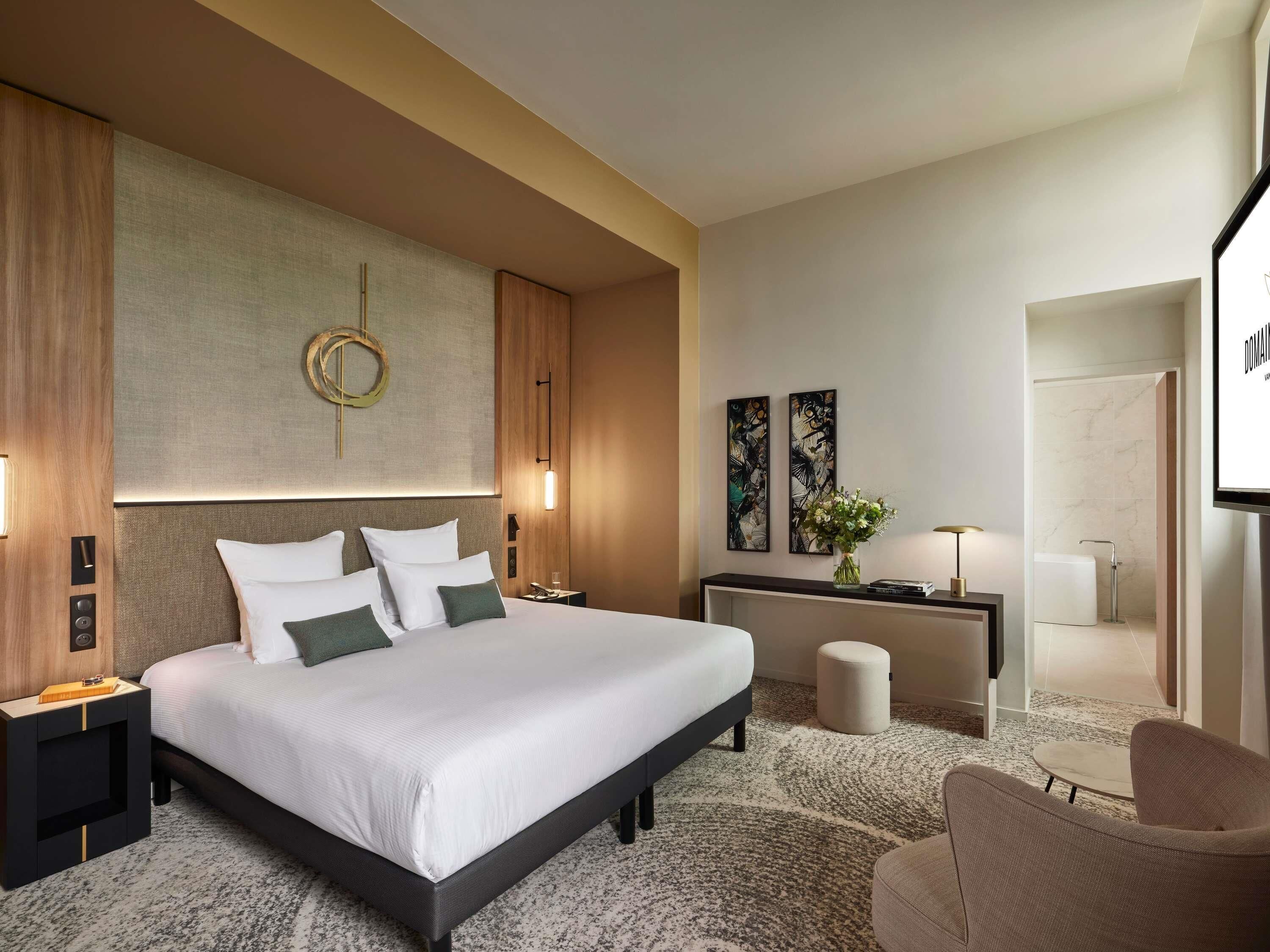 Suite Deluxe, 1 cama matrimonial | Camas con pillow-top y artículos del minibar gratis 