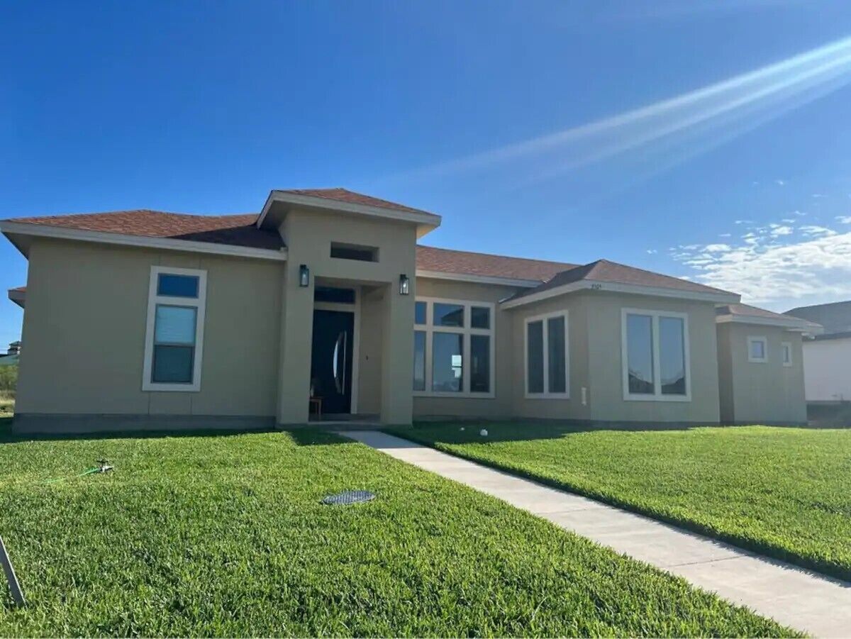 Corner lot home with 2-covered parking spots and plenty of street parking.