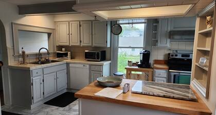 Garden setting within walking distance of River, Local Shops, and Restaurants!