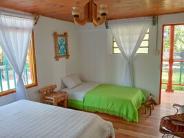 Deluxe Triple Room, Patio, Garden View | Individually decorated, individually furnished, bed sheets