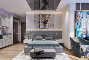 高級寝具、ピロートップベッド、ミニバー、客室ごとに異なる装飾