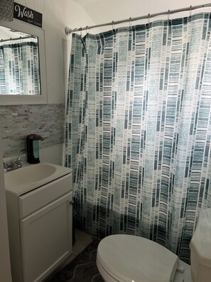 Hair dryer, towels, soap, toilet paper