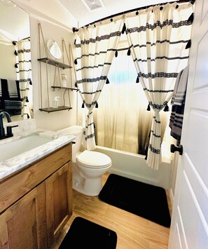 Hair dryer, towels, soap, shampoo