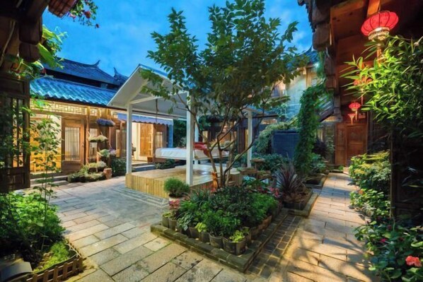 Garden - Yun Qie Man Xin hua Lu Fang Inn (Lijiang)