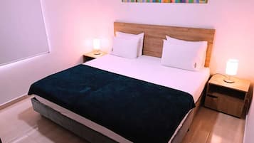 Deluxe Suite, City View | 1 bedroom, iron/ironing board, free WiFi