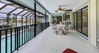 Island Escape - Waterfront pool home! Walk to the beach!