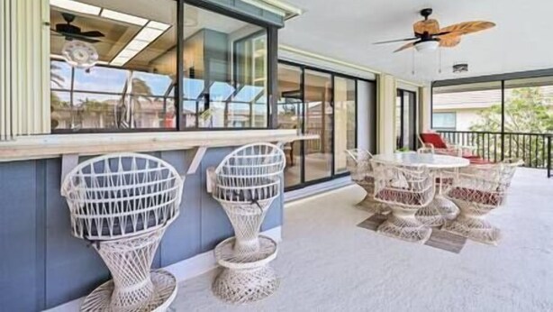Outdoor dining - Island Escape - Waterfront pool home! Walk to the beach! (Marco Island)