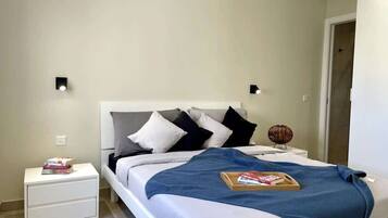 2 habitaciones, tabla de planchar con plancha, wifi y ropa de cama