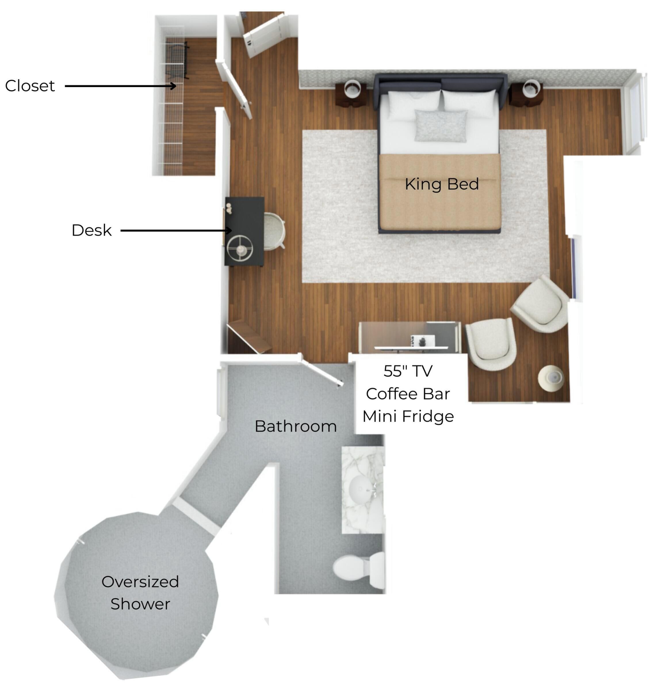 A bedroom with a king bed, a desk, a closet, a bathroom, a 55' TV, a coffee bar, a mini fridge, and an oversized shower.