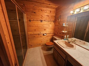 Shower, jetted bath, towels, soap