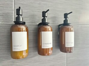 Shower, hair dryer, towels, soap