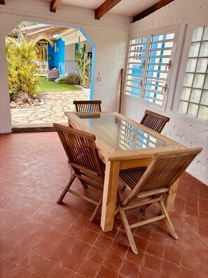 Outdoor dining - Caraibes in Blue, apt with swimming pool and magnificent view of Les Saintes. (Vieux-Fort)