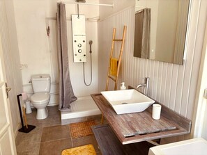 Shower, towels, soap, toilet paper