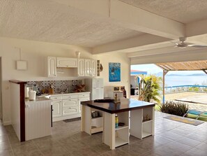 Private kitchen - Caraibes in Blue, apt with swimming pool and magnificent view of Les Saintes. (Vieux-Fort)