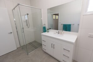 Shower, hair dryer, soap, shampoo