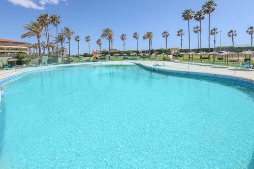 LAS AMERICAS - Wonderful beachfront flat with shared pool and Free WiFi