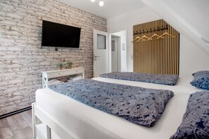 1 chambre, fer et planche à repasser, Wi-Fi gratuit, draps fournis