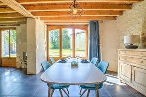 Dining - Gîte Le Pigeonnier with Shared Pool, Wi-Fi, and Air Conditioning (Chassaignes)