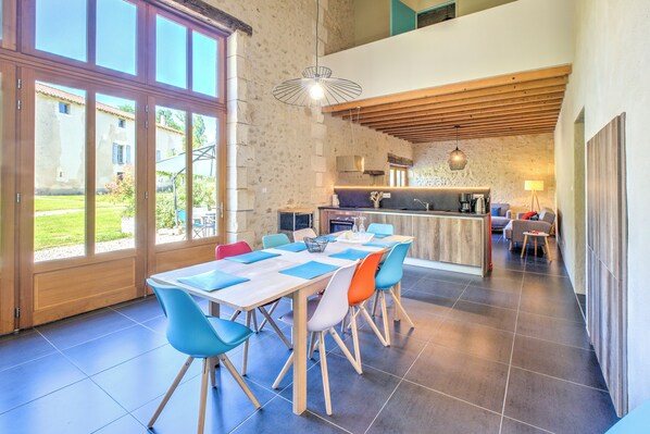 Dining - Gîte La Grange with Shared Pool, Private Terrace and Wi-Fi (Chassaignes)