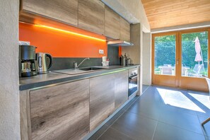 Fridge, microwave, oven, stovetop - 'Gîte Le Gardien' with Shared Pool, Private Terrace, and Wi-Fi (Chassaignes)