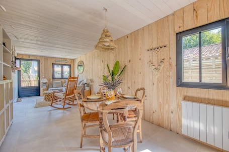 Dining. Holiday Home 'De Charme Au Bord Du Lac' with Private Terrace, Garden and Wi-Fi