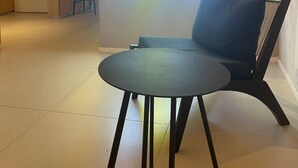 A reception area with a neon sign reading "NEXT PAULISTA" and a modern seating arrangement. - Jardim Paulista Studio Completo (Jardim Paulista São Paulo)