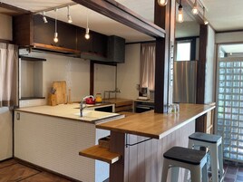 Western Style Double Room 204, Non Smoking | Shared kitchen | Full-size fridge, microwave, stovetop, rice cooker