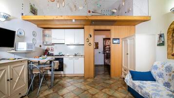 Apartamento família, 1 quarto, micro-ondas (Su Entu) | Cozinha privada | Geladeira, micro-ondas, fogão, cooktop