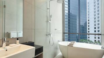 Separate tub and shower, rainfall showerhead, free toiletries