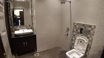 Shower, rainfall showerhead, towels, soap