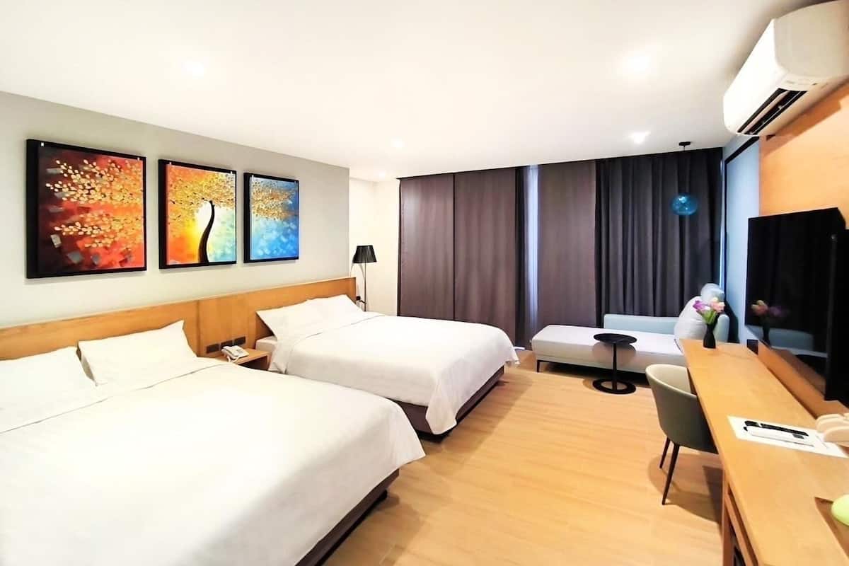Habitación cuádruple Deluxe | Decoración personalizada y wifi gratis