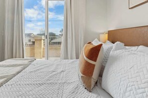 4 bedrooms, travel crib, WiFi, bed sheets