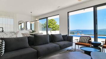 Villa (Five bedroom Villa with Terrace and S) | Living room | 32-inch flat-screen TV with digital channels