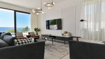 Villa (Five bedroom Villa with Terrace and S) | Living room | 32-inch flat-screen TV with digital channels