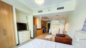 Classic Studio, Balcony, City View | Iron/ironing board, free WiFi, individually furnished - Yogi - Chic Studio with City Views in Goldcrest Views (Dubai)