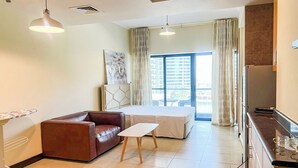 Classic Studio, Balcony, City View | Iron/ironing board, free WiFi, individually furnished - Yogi - Chic Studio with City Views in Goldcrest Views (Dubai)