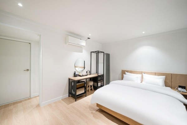 Kamar Deluks | Wi-Fi gratis dan seprai linen