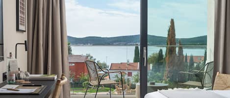 Deluxe Double Room, Balcony, Sea View | 1 bedroom, in-room safe, desk, blackout drapes