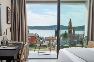 Superior Double Room, Balcony, Sea View | 1 bedroom, in-room safe, desk, blackout drapes