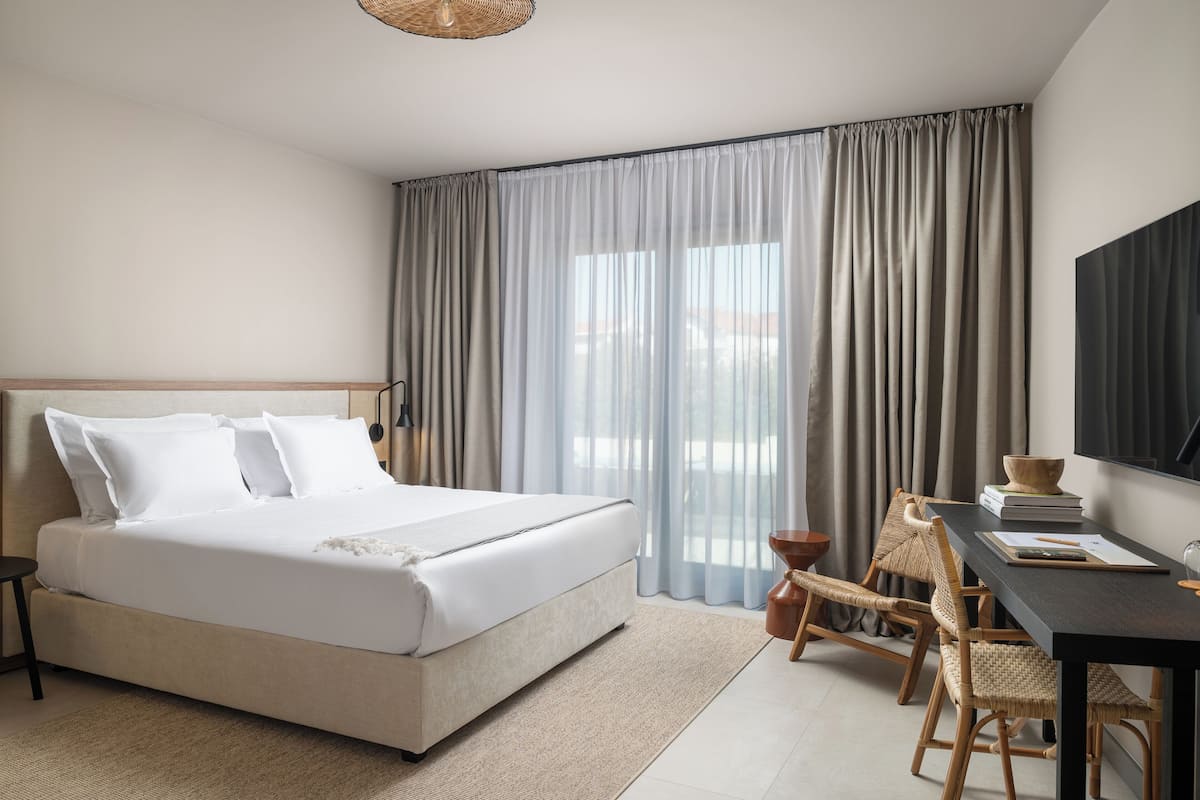 Family Suite, Balcony | 1 bedroom, in-room safe, desk, blackout curtains