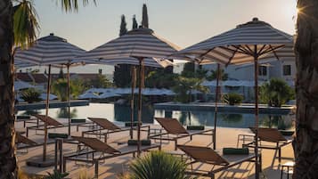 2 outdoor pools, pool umbrellas, sun loungers