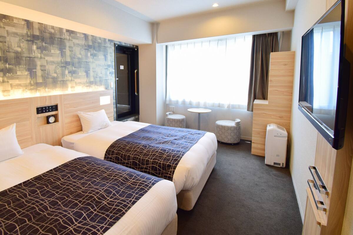 Superior Twin kamer | Donsdekens, verduisterende gordijnen, gratis wifi, beddengoed