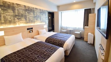 Quarto duplo superior | Edredons de pluma, cortinas blackout, Wi-Fi de cortesia, roupa de cama
