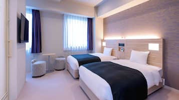 Deluxe Twin Room | Down comforters, blackout drapes, free WiFi, bed sheets