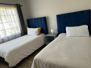 Casa | 3 habitaciones, tabla de planchar con plancha y wifi gratis 