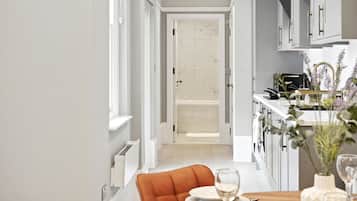 Economy Apartment, 1 King Bed with Sofa bed | Private kitchen | Full-sized fridge, microwave, oven, stovetop
