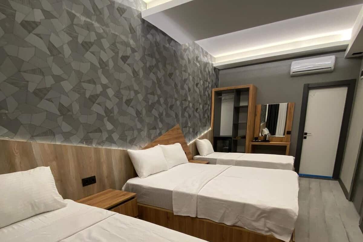 Standard Quadruple Room, Multiple Beds | Frette Italian sheets, premium bedding, blackout curtains, soundproofing