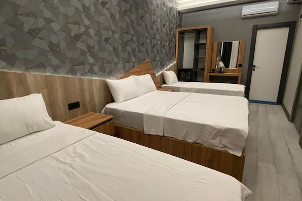 Frette Italian sheets, premium bedding, blackout curtains, soundproofing